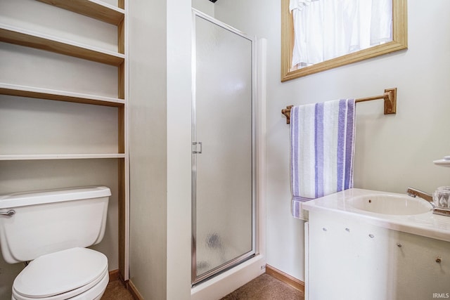 619 Widaman St, Warsaw, IN 46580 - bathroom featuring toilet, vanity, baseboards, and a stall shower