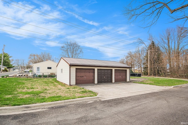 619 Widaman St, Warsaw, IN 46580 - detached garage featuring fence