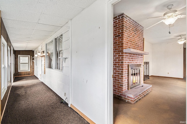619 Widaman St, Warsaw, IN 46580 - hallway with a paneled ceiling, baseboards, and carpet floors