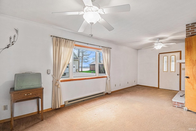 619 Widaman St, Warsaw, IN 46580 - interior space with baseboards, a ceiling fan, carpet flooring, and baseboard heating