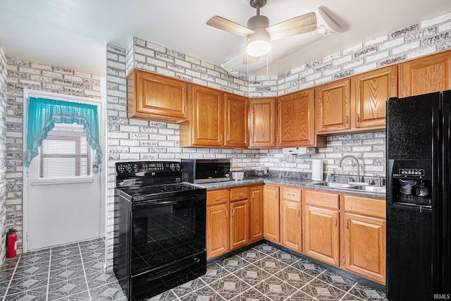 619 Widaman St, Warsaw, IN 46580 - kitchen with a ceiling fan, black appliances, brown cabinetry, decorative backsplash, and a sink