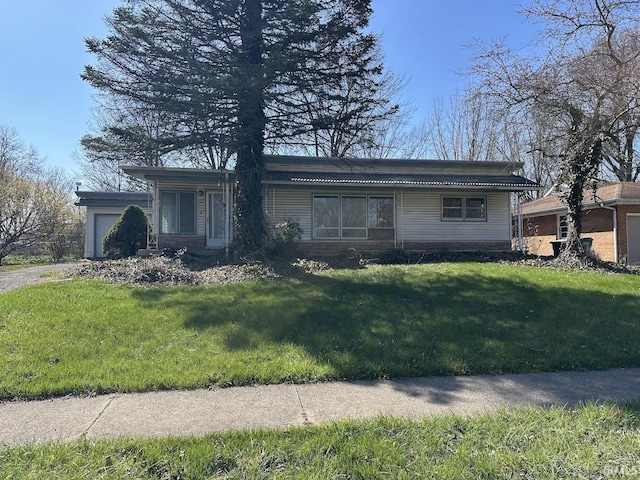 1501 Lafayette St, Valparaiso, IN 46383 - view of front of house featuring an attached garage and a front lawn