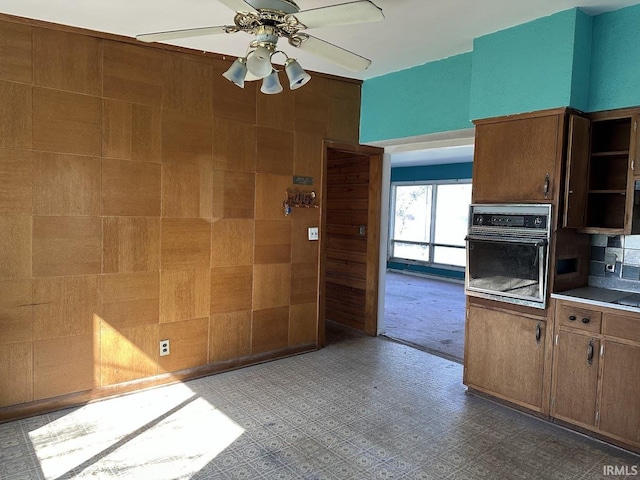 1501 Lafayette St, Valparaiso, IN 46383 - kitchen featuring light countertops, oven, ceiling fan, and open shelves