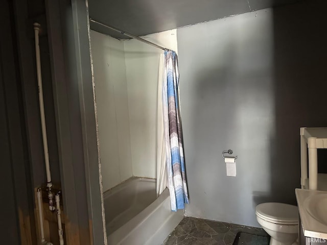 full bath featuring a sink, toilet, and shower / bath combination with curtain
