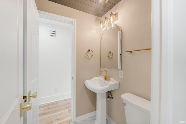 bathroom featuring toilet