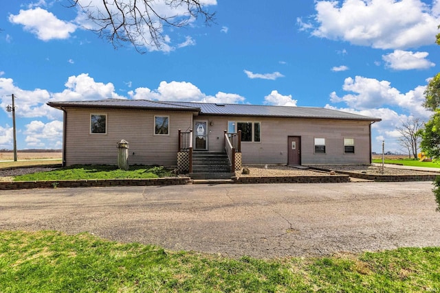104 S Meridian Rd, Rochester, IN 46975 - view of front of property featuring metal roof