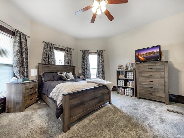 bedroom featuring carpet and a ceiling fan