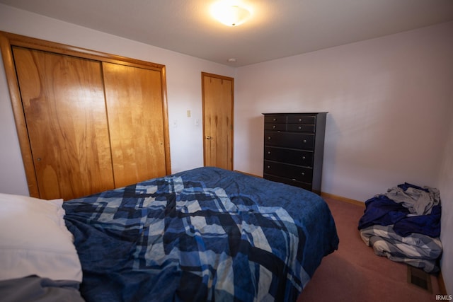 carpeted bedroom with baseboards