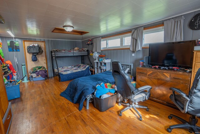 bedroom featuring wood finished floors