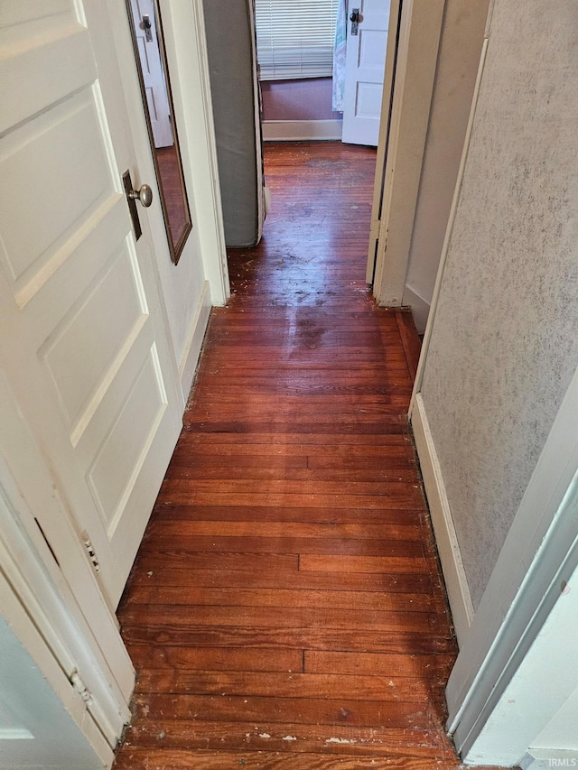 corridor featuring hardwood / wood-style flooring