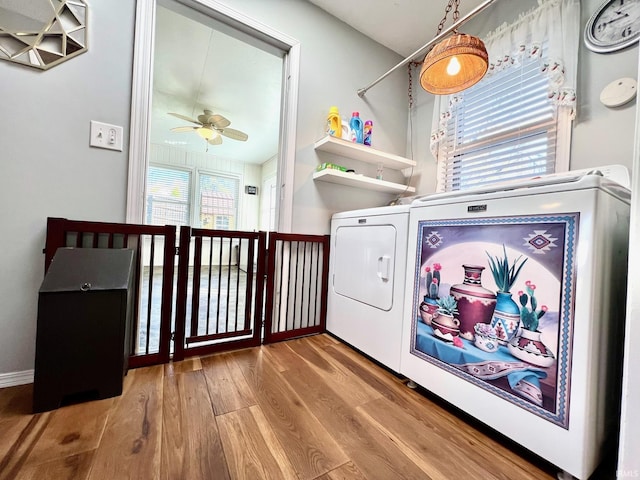 2119 Windwood Dr, Bedford, IN 47421 - laundry area with laundry area, a ceiling fan, and wood finished floors