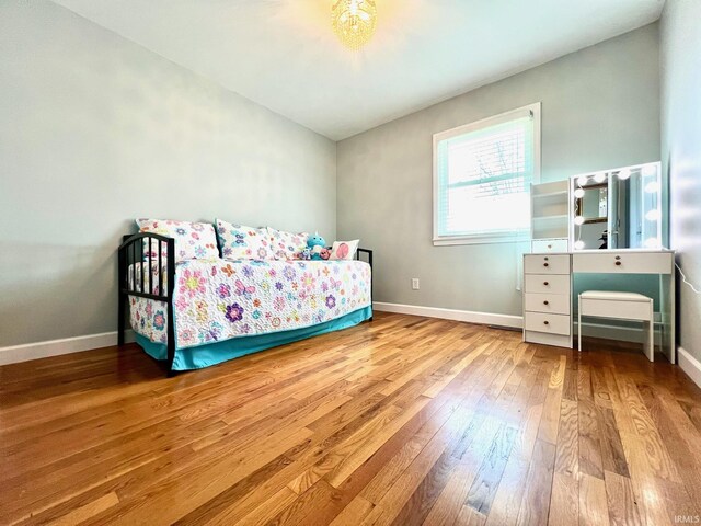 2119 Windwood Dr, Bedford, IN 47421 - bedroom with wood-type flooring and baseboards