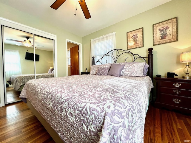 2119 Windwood Dr, Bedford, IN 47421 - bedroom featuring dark wood-style flooring, a closet, and ceiling fan