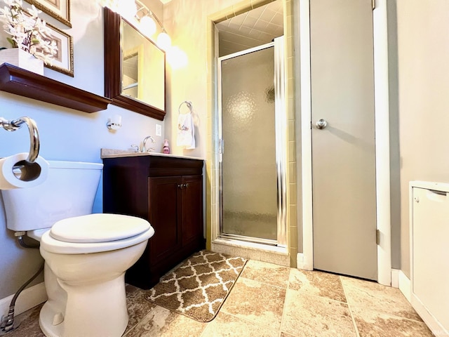 2119 Windwood Dr, Bedford, IN 47421 - full bathroom with a shower stall, vanity, and toilet
