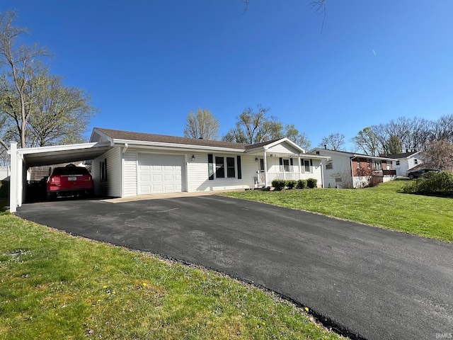 2119 Windwood Dr, Bedford, IN 47421 - single story home featuring a front yard, a porch, a garage, an attached carport, and driveway