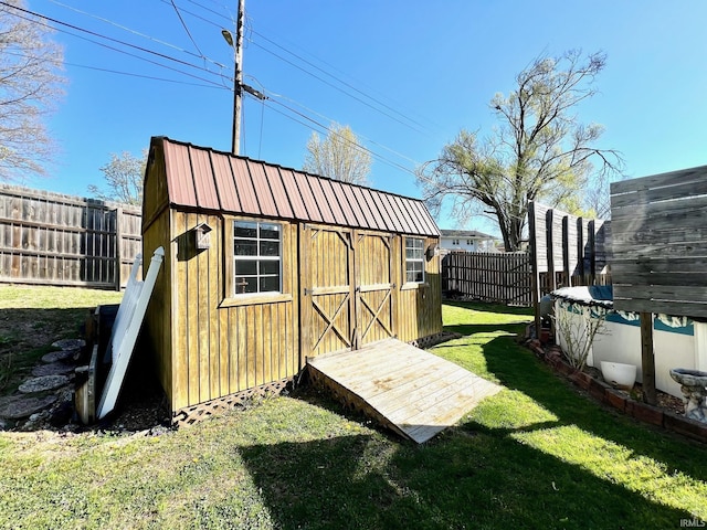 2119 Windwood Dr, Bedford, IN 47421 - view of shed with a fenced backyard