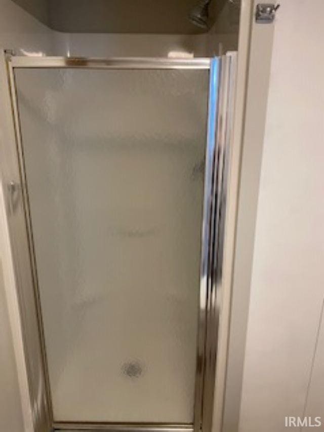 bathroom with a stall shower