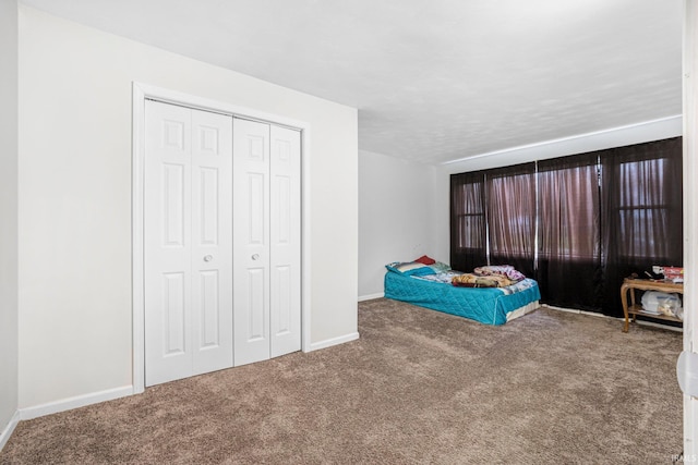 3930 Abbott St, Fort Wayne, IN 46806 - unfurnished bedroom featuring a closet, baseboards, and carpet