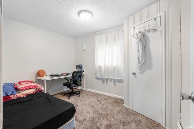 3930 Abbott St, Fort Wayne, IN 46806 - bedroom featuring baseboards, carpet flooring, and a textured ceiling