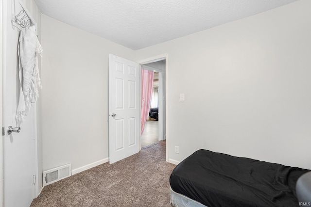3930 Abbott St, Fort Wayne, IN 46806 - carpeted bedroom featuring a textured ceiling, baseboards, and visible vents