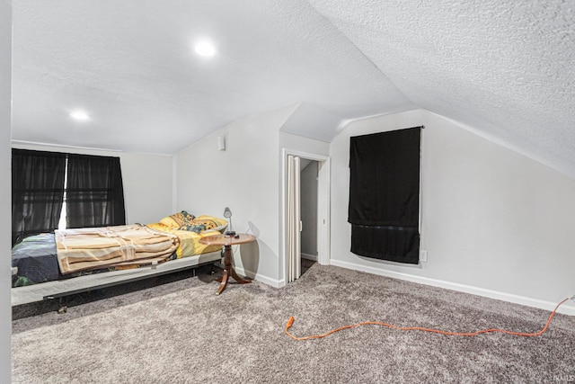 3930 Abbott St, Fort Wayne, IN 46806 - bedroom with baseboards, carpet flooring, a textured ceiling, and vaulted ceiling