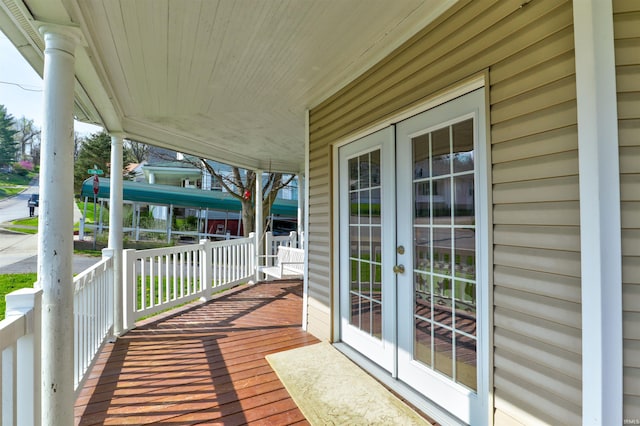 deck featuring french doors and covered porch