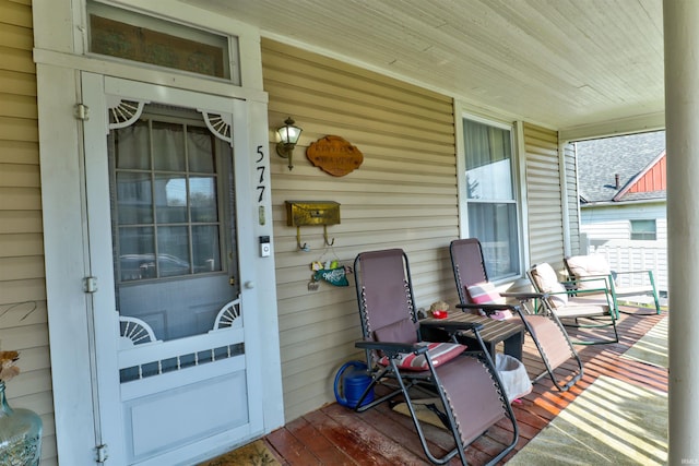 wooden deck featuring covered porch