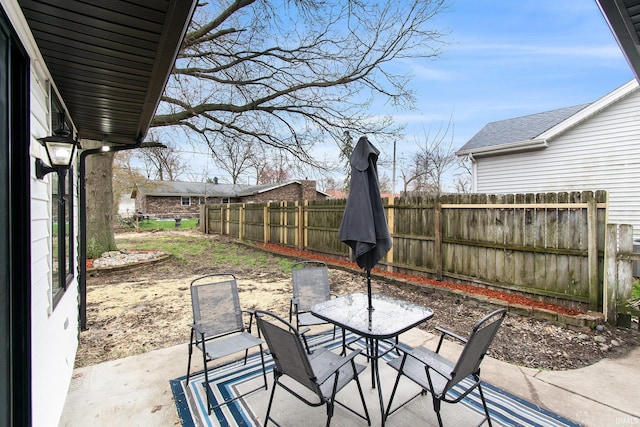 214 Parkwood Ln, South Bend, IN 46619 - view of patio / terrace with outdoor dining area and fence