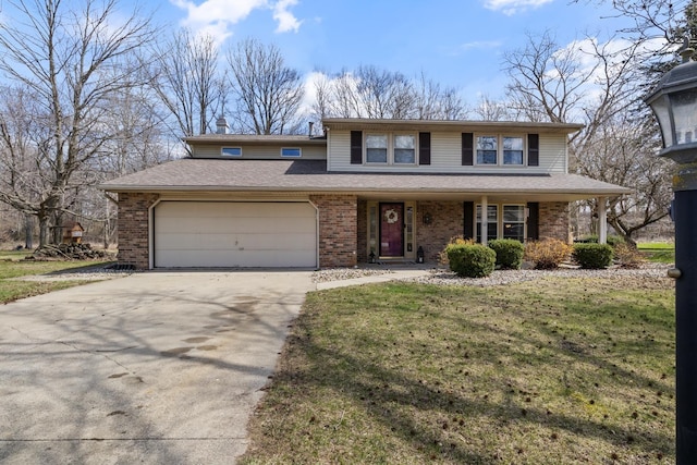 view of front of home with a shingled roof, an attached garage, driveway, brick siding, and a front yard