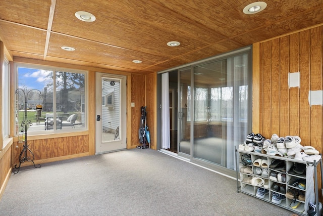unfurnished sunroom featuring a wealth of natural light