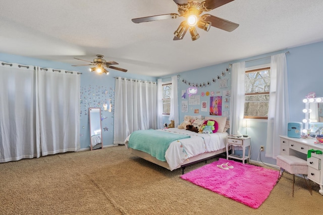 bedroom featuring carpet and ceiling fan