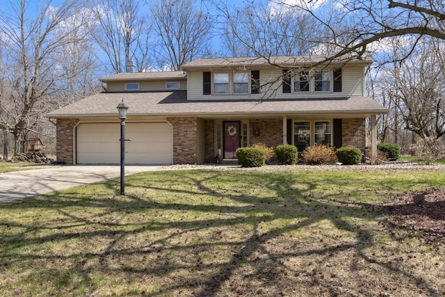 traditional home with a front lawn, driveway, brick siding, an attached garage, and a shingled roof