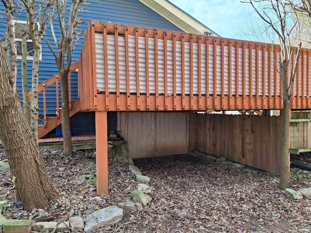 wooden terrace with fence and stairway