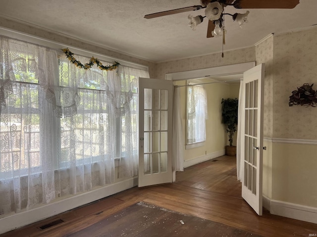 unfurnished sunroom featuring french doors and visible vents