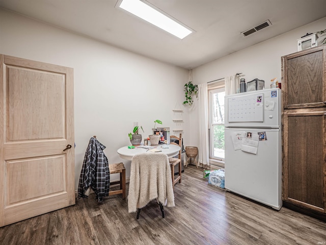 8901 Vienna Rd, Evansville, IN 47720 - dining room featuring wood finished floors and visible vents
