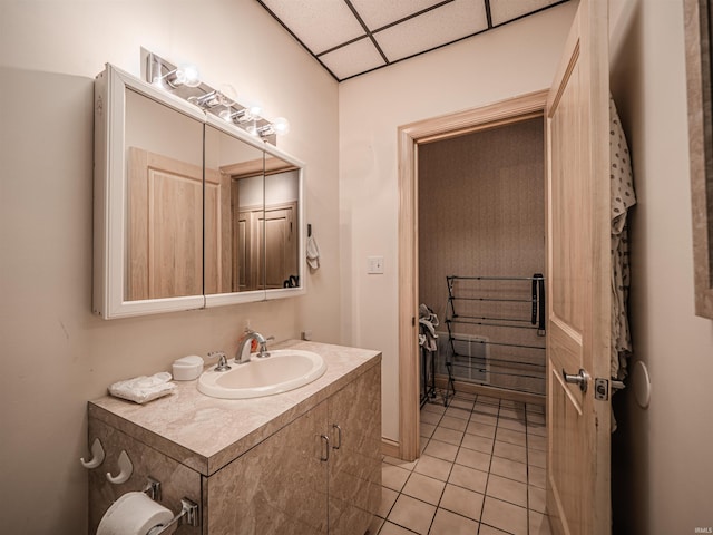 8901 Vienna Rd, Evansville, IN 47720 - bathroom with vanity, tile patterned flooring, and a paneled ceiling