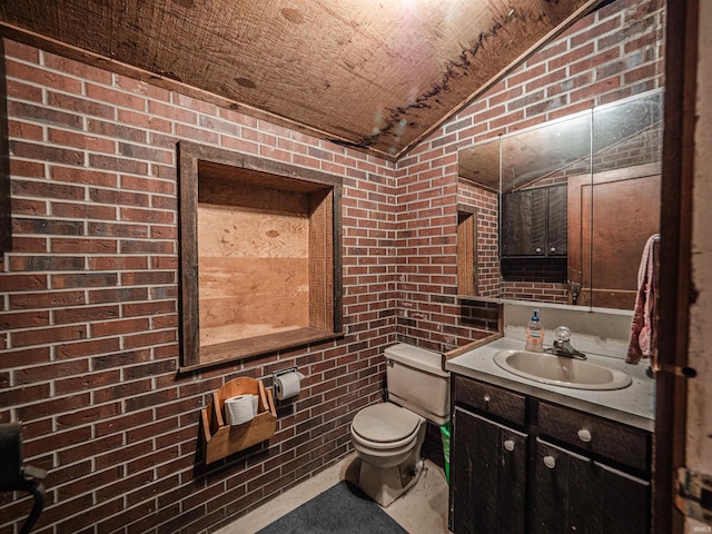 8901 Vienna Rd, Evansville, IN 47720 - half bath with brick wall, lofted ceiling, toilet, and vanity