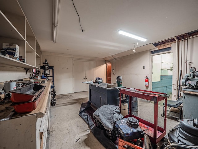8901 Vienna Rd, Evansville, IN 47720 - interior space featuring a workshop area and unfinished concrete flooring