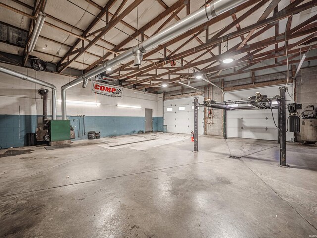 8901 Vienna Rd, Evansville, IN 47720 - garage featuring concrete block wall