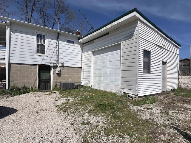 110 SW 3rd St, Paoli, IN 47454 - view of side of property with central AC and an outbuilding