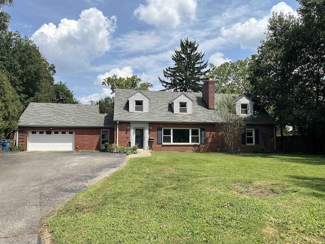 6065 Gladden Dr, Indianapolis, IN 46220 - cape cod house featuring brick siding, a front lawn, a garage, and aphalt driveway