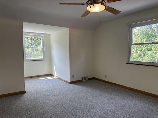 6065 Gladden Dr, Indianapolis, IN 46220 - carpeted empty room with plenty of natural light, visible vents, baseboards, and ceiling fan