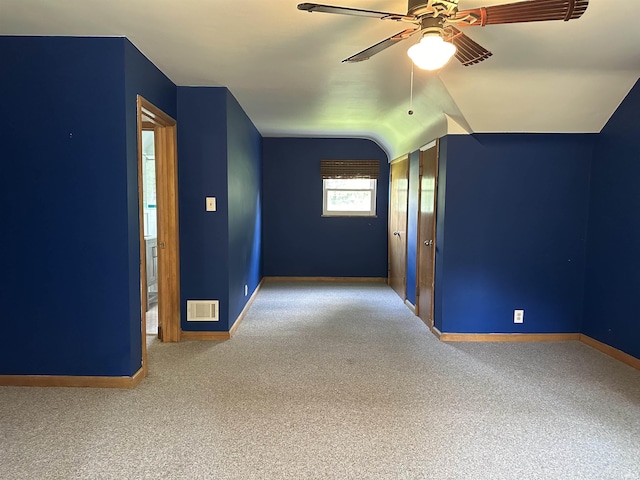6065 Gladden Dr, Indianapolis, IN 46220 - bonus room with a ceiling fan, baseboards, lofted ceiling, carpet flooring, and visible vents