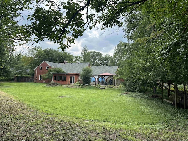 6065 Gladden Dr, Indianapolis, IN 46220 - view of yard with fence and a gazebo