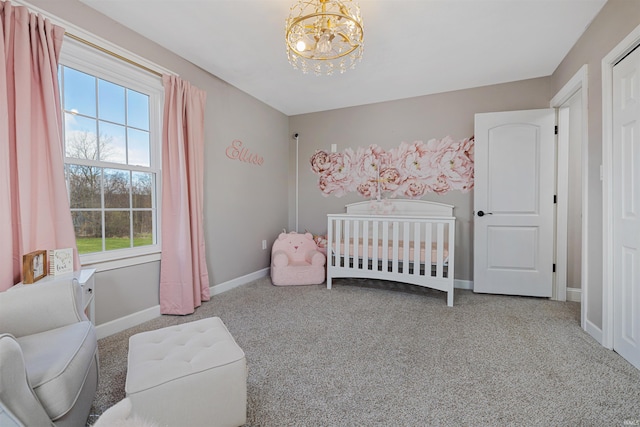 6891 E Hopewell Rd, Avilla, IN 46710 - carpeted bedroom featuring a nursery area, baseboards, multiple windows, and a chandelier