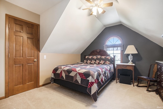 bedroom featuring lofted ceiling, carpet floors, a ceiling fan, and baseboards