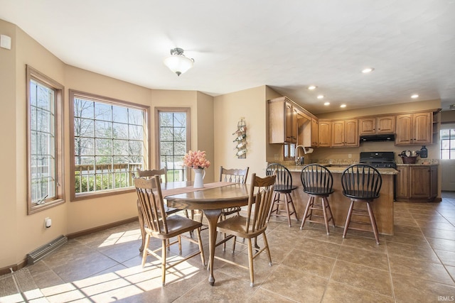 dining space featuring baseboards, visible vents, recessed lighting, and light tile patterned flooring