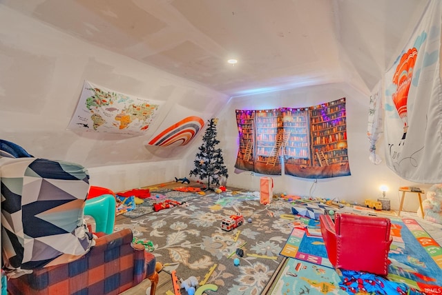 rec room with lofted ceiling