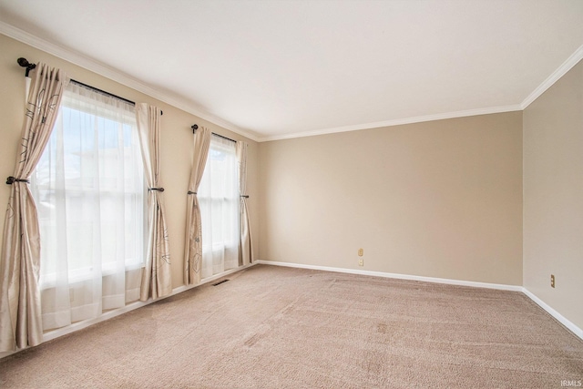 22486 Fireside Dr, Goshen, IN 46528 - unfurnished room featuring light colored carpet, baseboards, crown molding, and visible vents