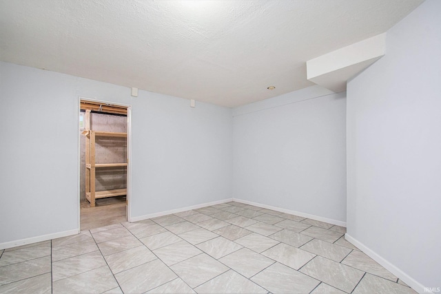 22486 Fireside Dr, Goshen, IN 46528 - unfurnished room with baseboards and light tile patterned floors